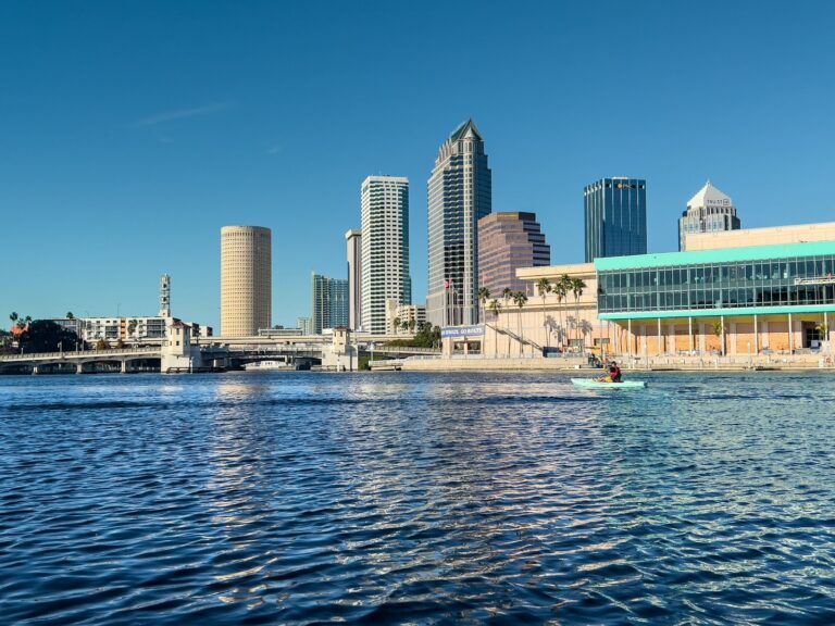 Boat on the river in front of the downtown Tampa skyline